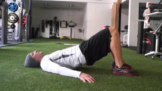 Isometric Glute Bridge with Ball Between Knees