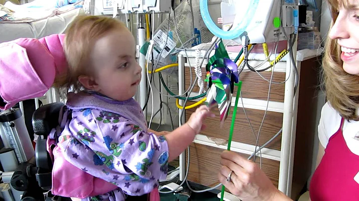 Rebekah Faith with full Trisomy 18 Playing with Pi...