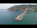 Alanya, Turkey. Dramatic aerial drone shot of Alanya Lighthouse and fortress on the cliff with su...