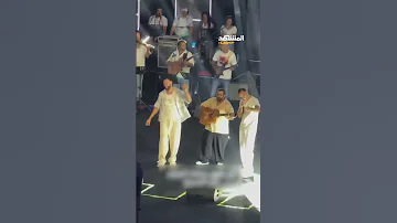 أول ظهور لعلي رؤوف صاحب أغنية أنا بشحت بالجيتار على المسرح الروماني بمارينا مع فرقة واما 