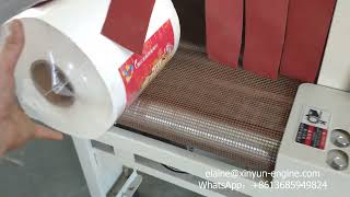Automatic maxi roll paper cutting machine and shrink labelling packing machine