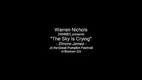 Warren Nichols singing streetside at a Fall Festiv...
