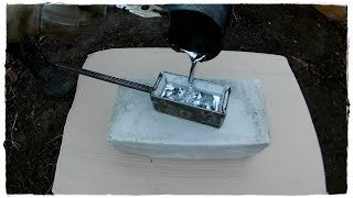Casting Lead into the recently welded Steel Mold. Got 1.1 kg (2.5 lbs) ingot