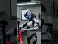 FUTURE ROBOT FIXING A BIKE.