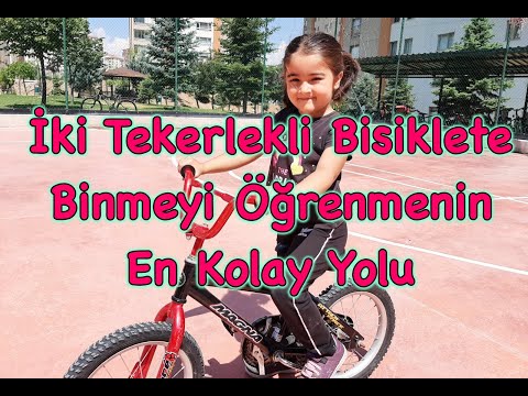 Video: Bir Bisiklete binmek için çocuğunuza nasıl öğretilir