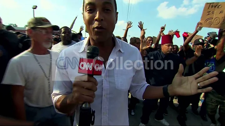 FERGUSON SHOOTING: CNN CREW PUSHED BACK BY POLICE