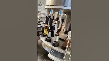 High speed rotary hot melt glue beer bottle paper label labeling machine labeling video