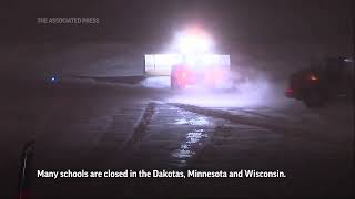 Parts of northern US shut down ahead of a winter storm