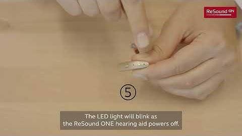 Turn on and off ReSound ONE rechargeable hearing aids through the push button