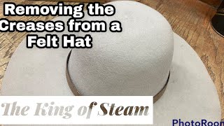 Cleaning felt hat and removing oil stain 