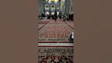 قبة الامام الرضا عليه السلام مع كتاب زيارة 