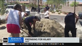 Indio residents stock on sandbags with heavy flooding possible