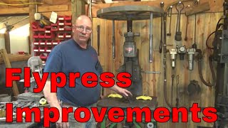 Flypress table modifications for improved clamping