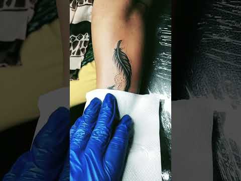 feather tattoo. Ink-man