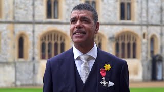 Chris Kamara receives his MBE at Windsor Castle