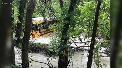 Bus driver charged for driving in high water