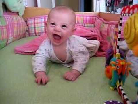 Ava's on her belly in her crib