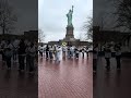 Music at the Monument: School Band Plays by Lady Liberty