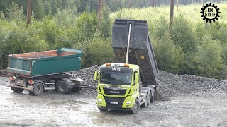 MAN TGX 8x4 gravel truck with Nor-slep Trio trailer