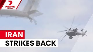 US and Iran trade strikes after helicopter downing | 7NEWS