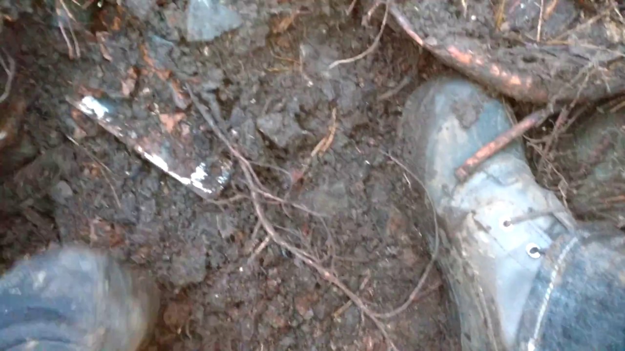 Digging a porcelain 1917 NH license plate in old cellar hole. - YouTube