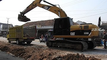 Excavator CAT 320D Work Loading Soil in Dump Truck | Widening Village Roads