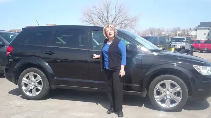 Janet Tischler and a 2009 Dodge Journey at McKie B...