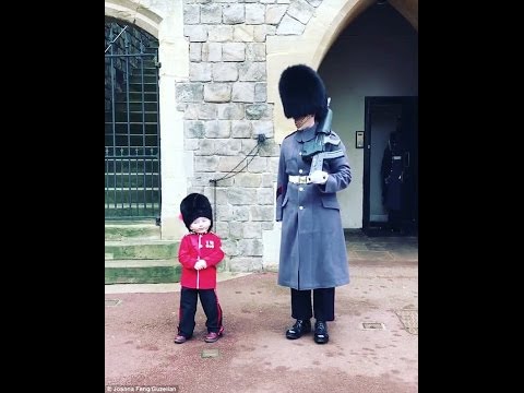 Boy, four, dressed as a mini guardsman melts hearts as he greets the real deal on a birthday