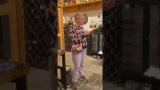 Judy reads the description of New Jozi in Broody