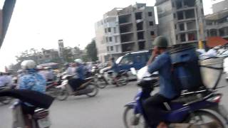 Crossroad without traffic lights in Hanoi