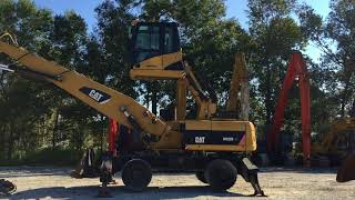 Cat M322D MH cab rising