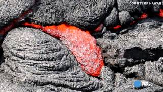 Sports Performance Oozing lava flows near a cemetery in Hawaii