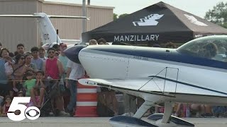 Cars race planes at Springdale airport