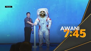 China memperlihatkan sut misi ke permukaan bulan