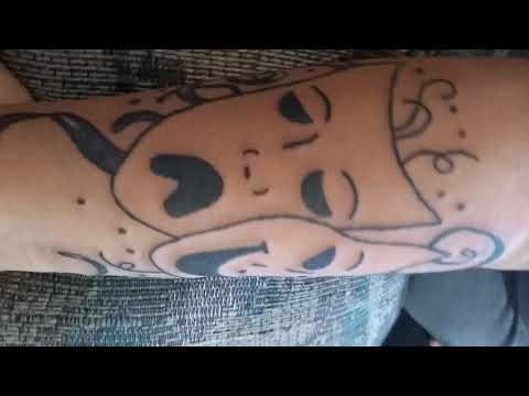 Tatuaje cara triste