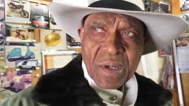 Outsider art cane and Wisdom by Poet Marcus Lockhart