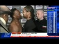 Dereck Chisora kisses Carl Baker during a staredown