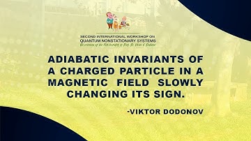 Adiabatic invariants of a charged particle in a magnetic field slowly changing its sign