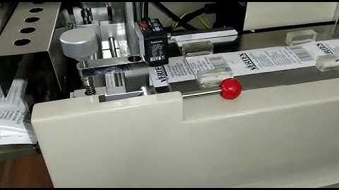 Label Cutting Machine for Taffeta & Satin by VERTEX