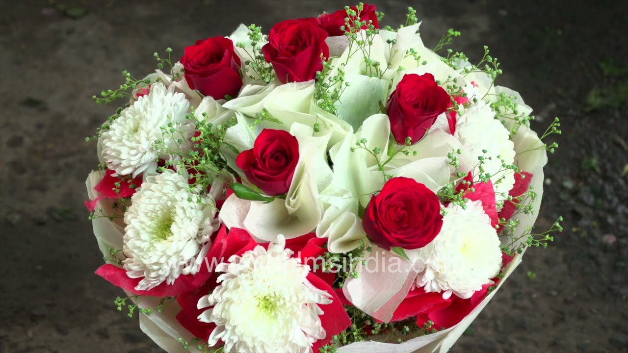 Vibrant atmosphere of flower shops at Chhatarpur Flower Market, Delhi