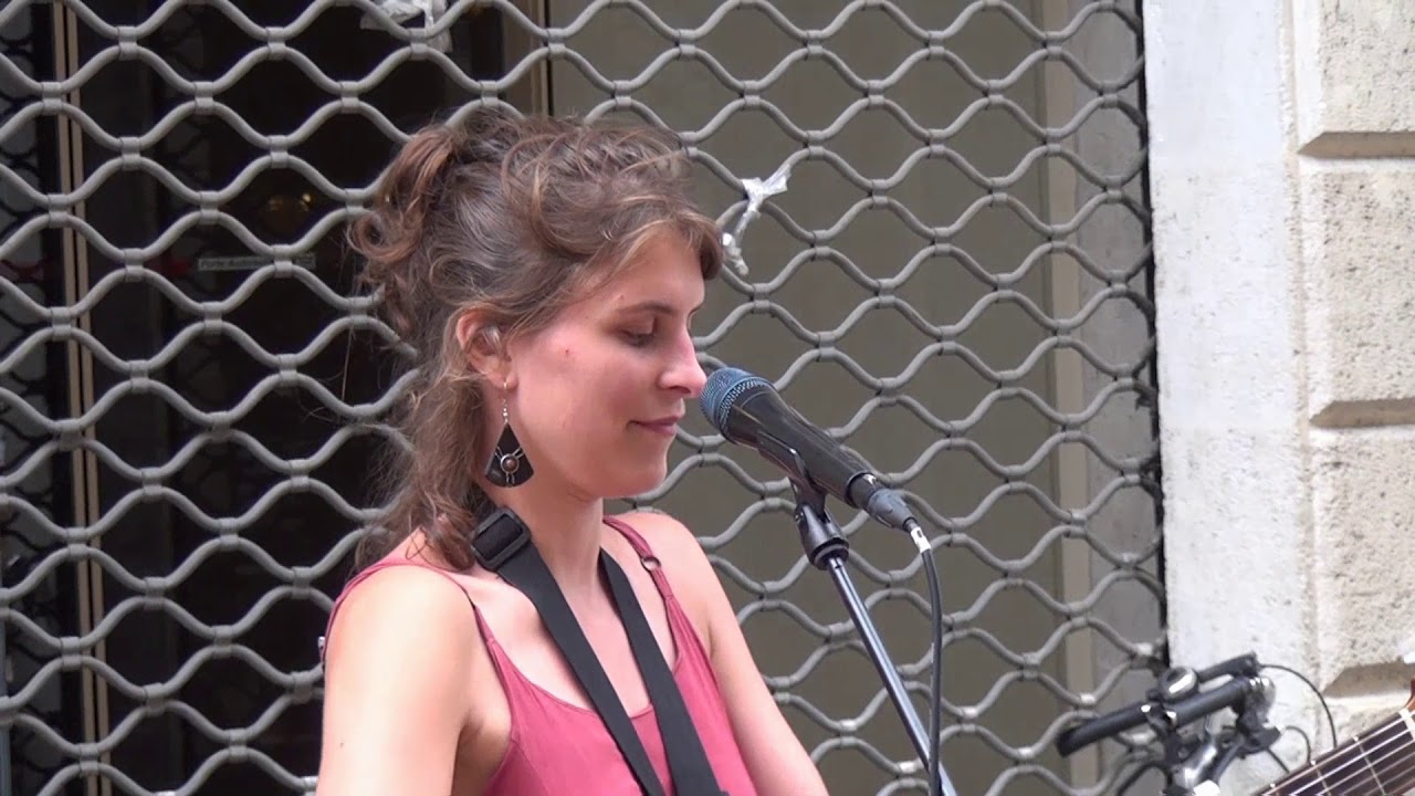Girl Busking in  Bordeaux France