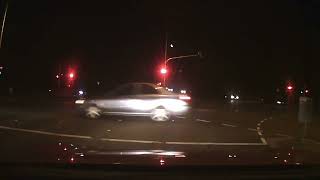 Idiot commodore driver blows a red light, nearly causes crash. Australia day, Dandenong. Dash cam.