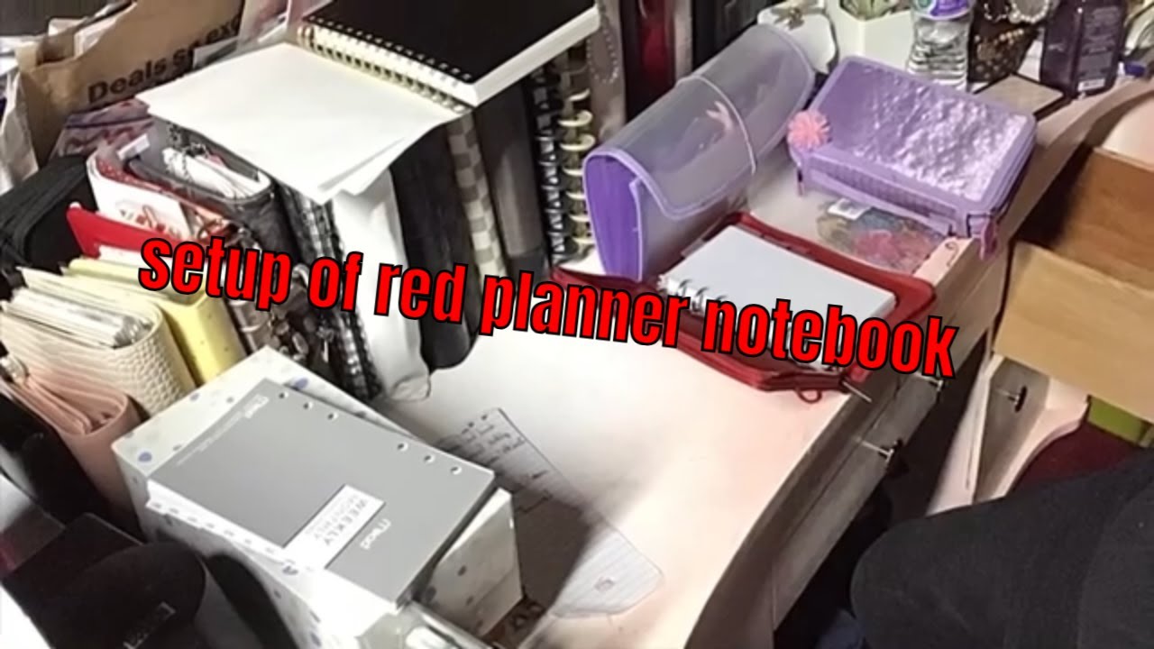 setup of red planner notebook