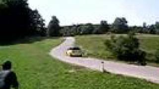 Mini Cooper With Laser Jama Exhaust Driving On A Curvy Road2