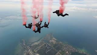 U.S. Army Parachute Team Jump from a C-147A Aircraft