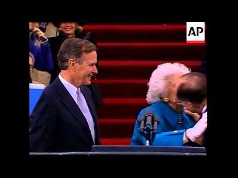 President George H.W. Bush takes the oath of office administered by Chief Justice William Rehnquist