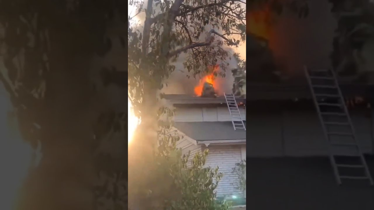 Firefighters Rescue Their Own As He Falls Through The Roof Of A Burning House 