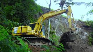 Lanslide Repair Watching A Komatsu Pc130F Excavator Stabilize A Mive Slope