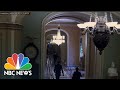 Security Footage Shows Officer Goodman Direct Sen. Romney To Safety During Capitol Riot | NBC News