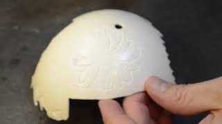Power carved ostrich eggshell